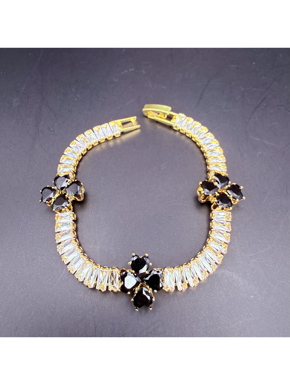 candy+clover clear baguette with black clover station gold tone bracelet
